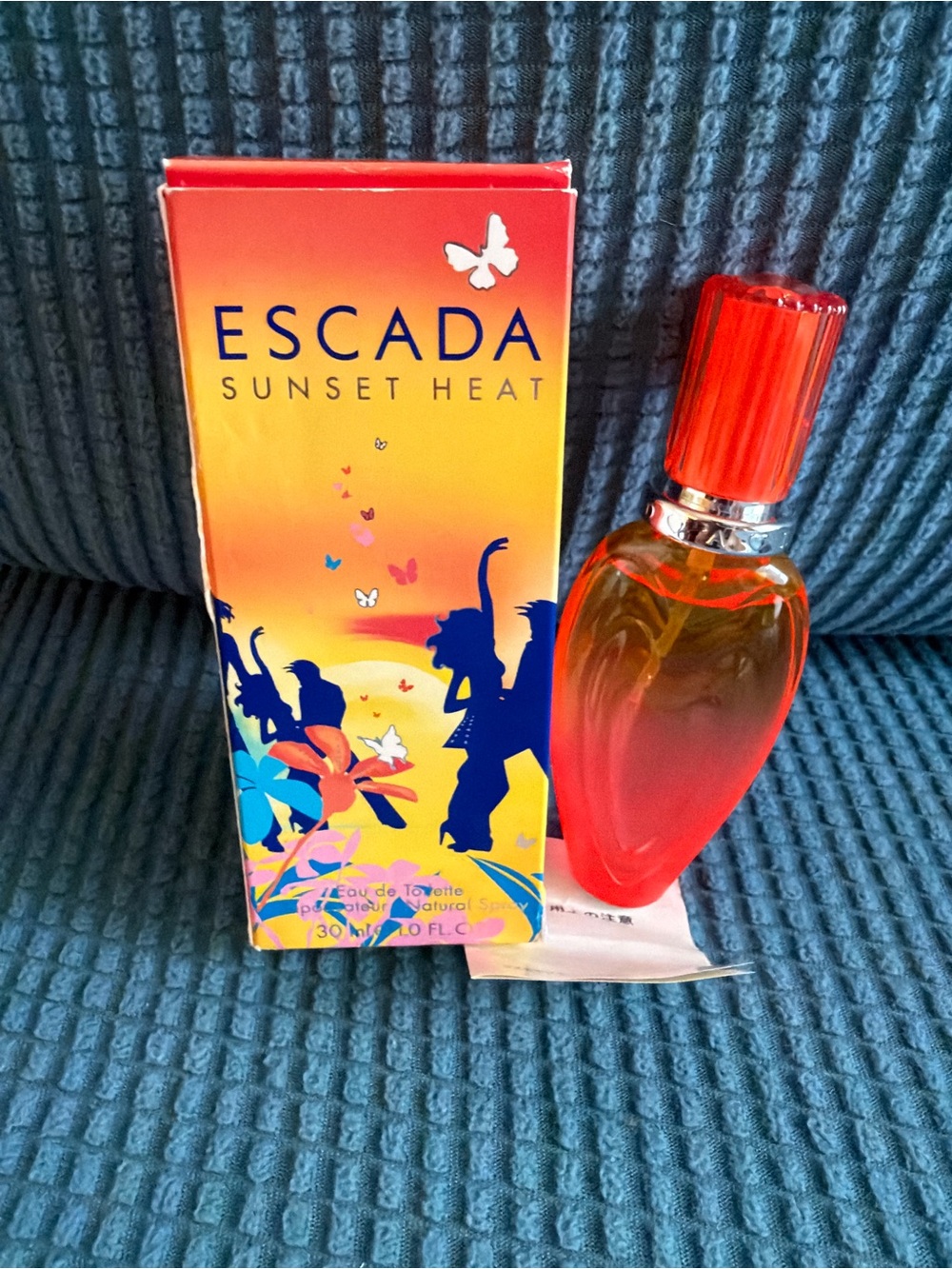 Escada Sunset Heat Women’s Perfume Bottle in Red and Orange Gradient